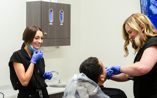 Elite Dental Care team caring for a patient in the Dyersburg office